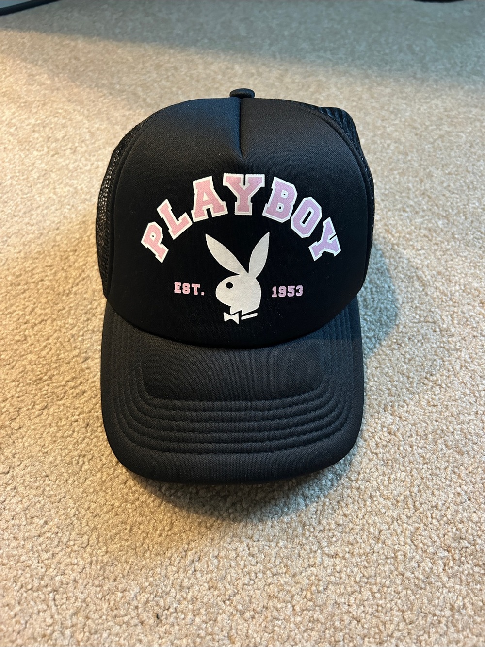 New playboy, black trucker hat with pink and white logo